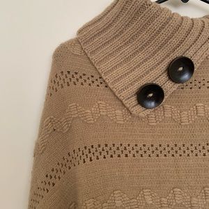 Beige knitted poncho